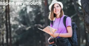 a person holding a map and camera